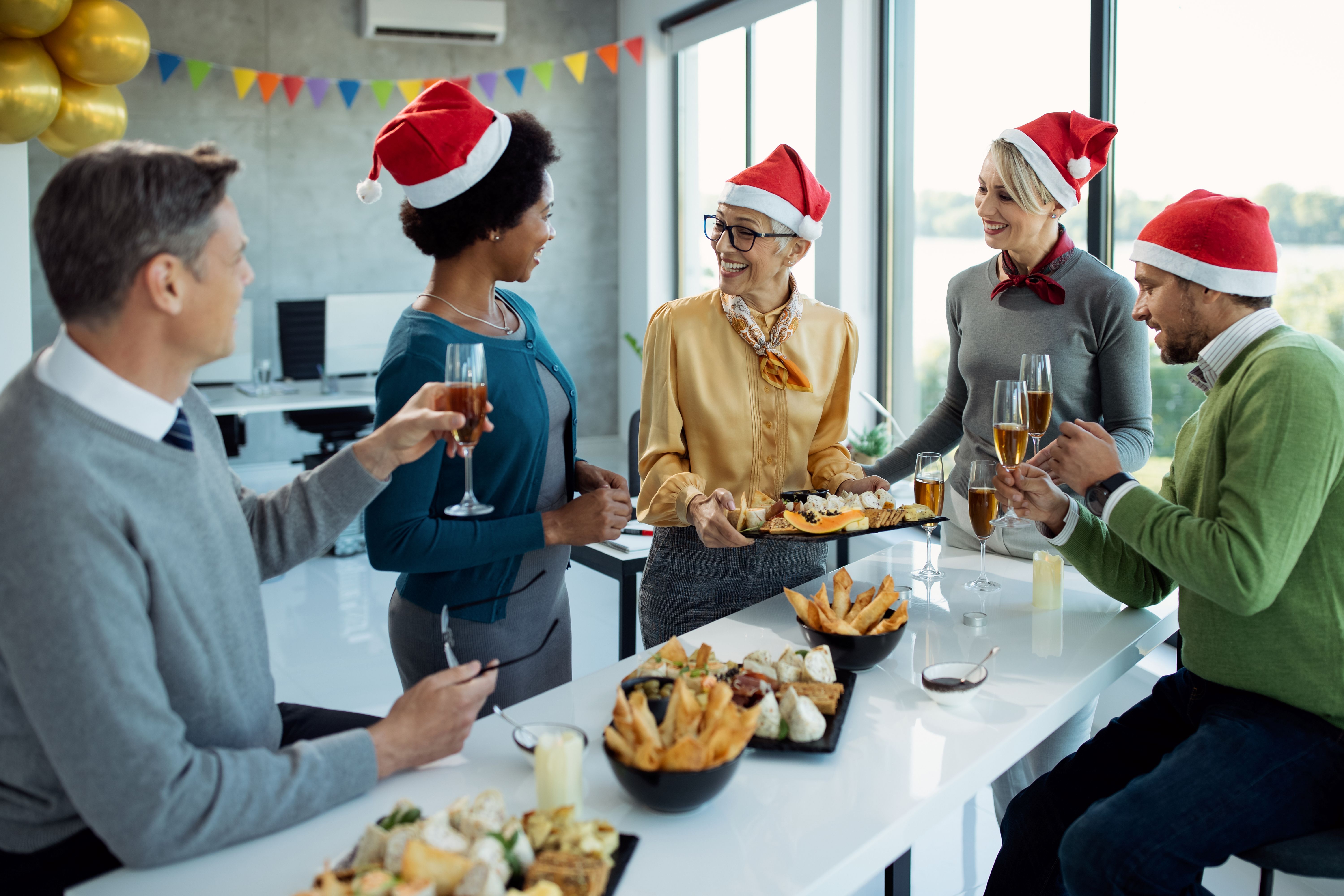 group-happy-business-colleagues-talking-christmas-party-office.jpg